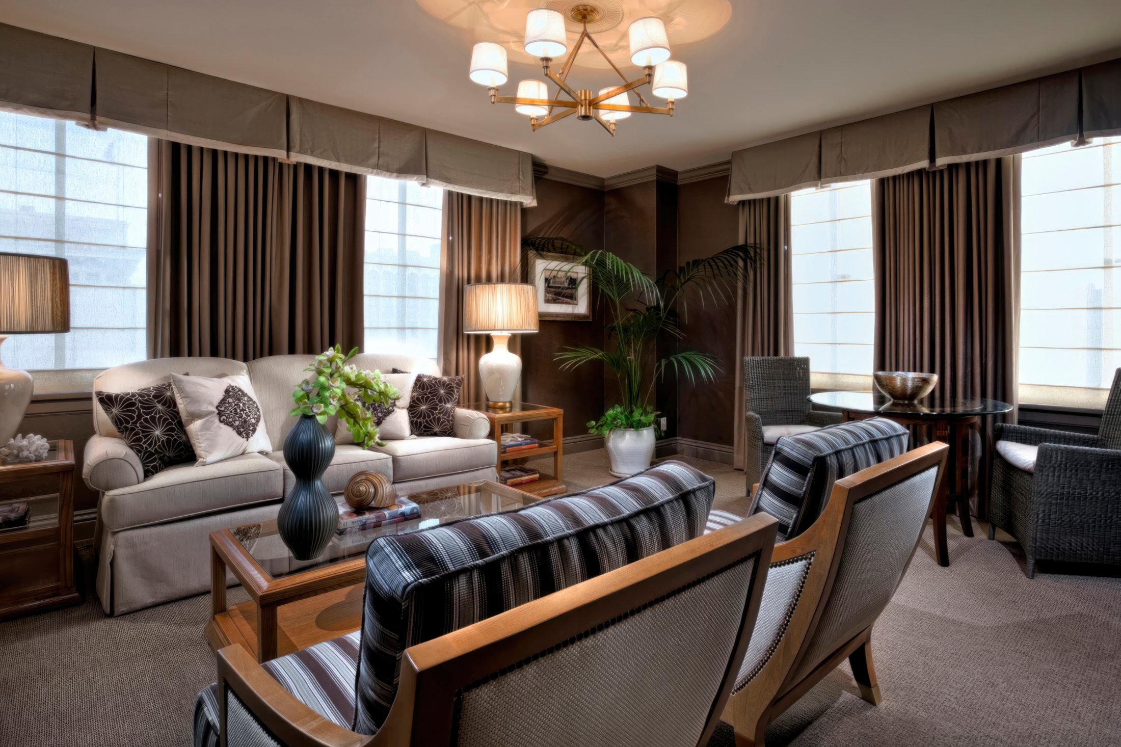 LA Hotel room with couch and comfortable seating and view of LA; Beaux-Arts hotel