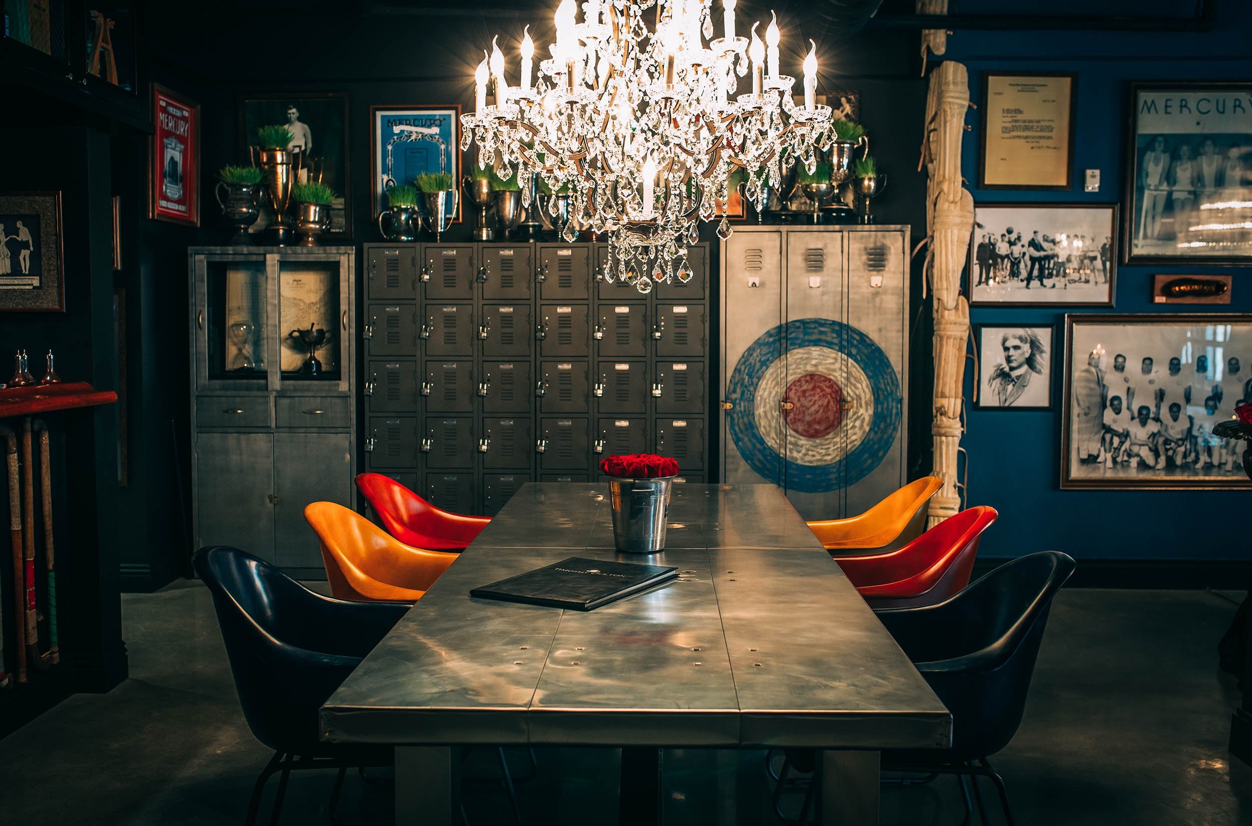 Los Angeles Authentic Club dining room featuring a chandelier and colorful seating.