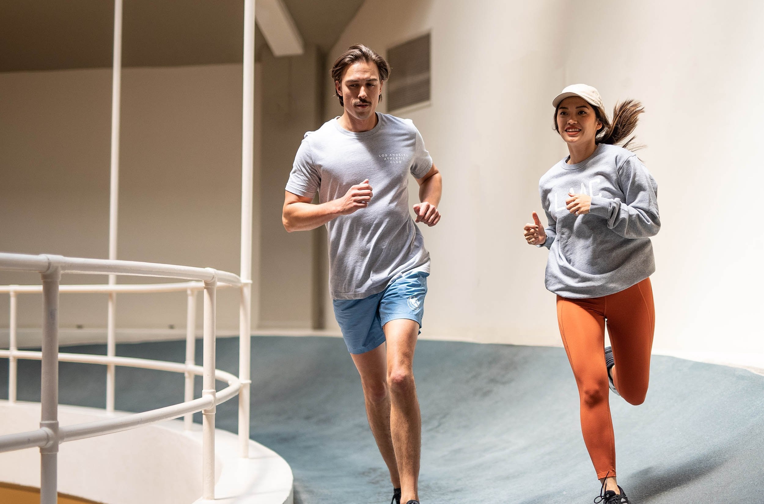 Man and woman running at the Los Angeles Athletic Club