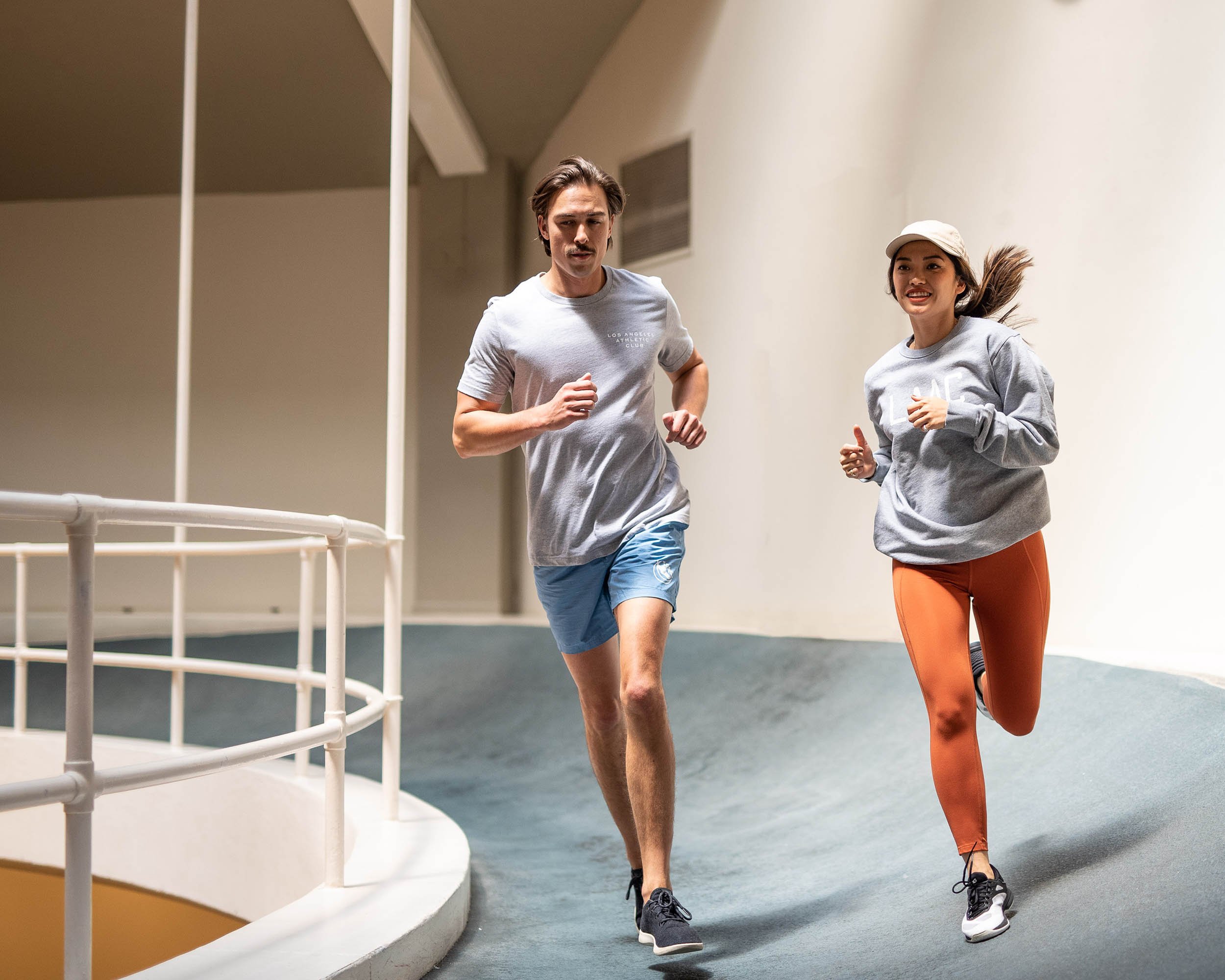 Man and woman running at the Los Angeles Athletic Club