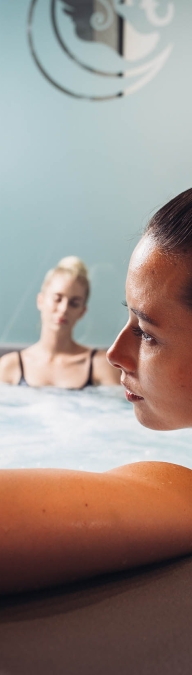 Group of women enjoying LA Athletic Club spa tub