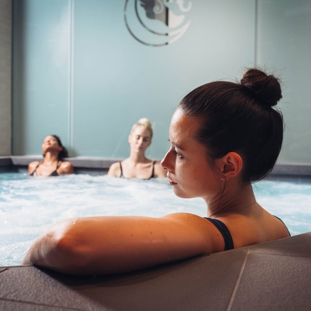 Group of women enjoying LA Athletic Club spa tub