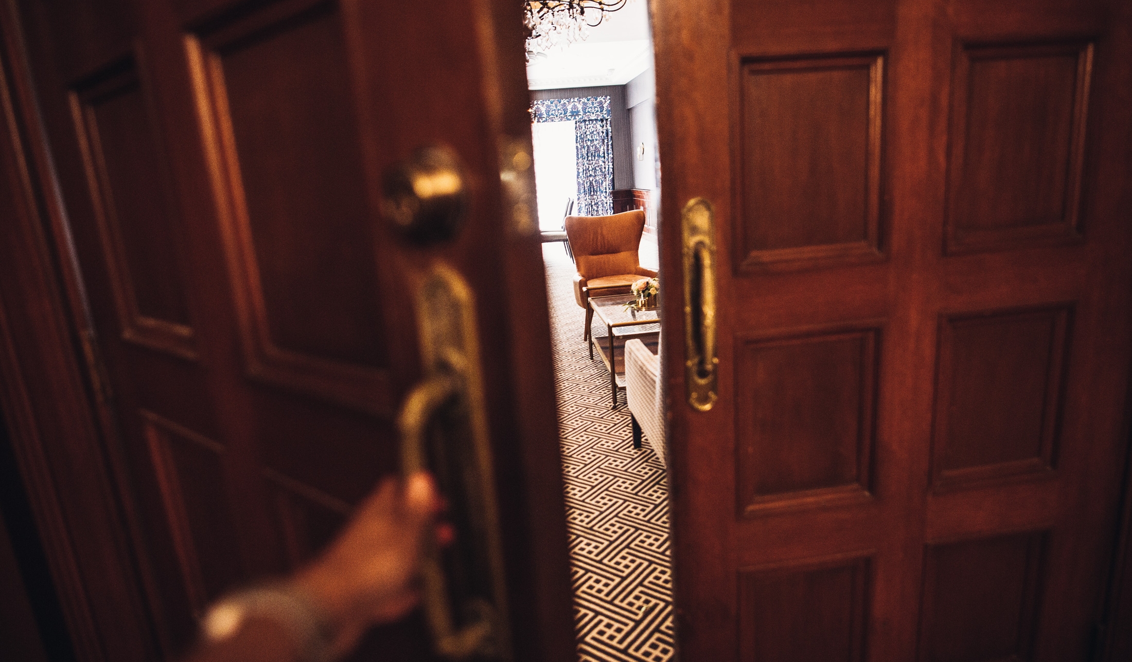 a view of a lobby through an open door