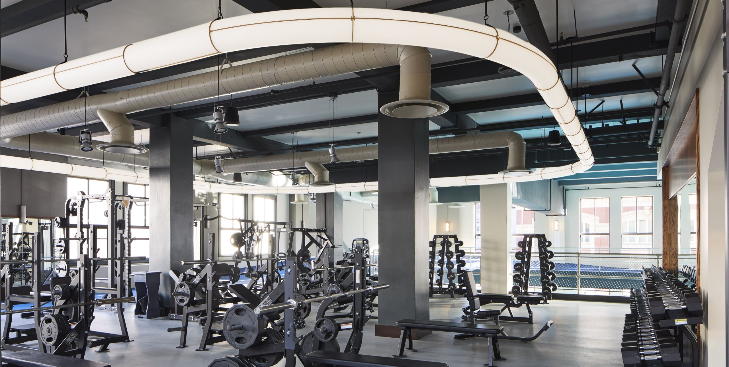 a gym with various exercise equipment
